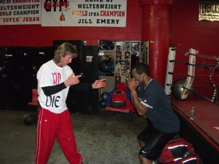 Boxing trainer Michael "Coach Mike" Kozlowski and Vivian Harris.