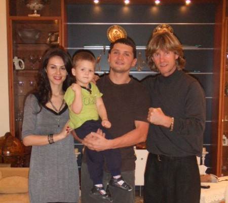Boxing trainer Michael "Coach Mike" Kozlowski with Timofey Kurgins family. His wife Liliana, Miss Ukraine 2002, and his son, Dima