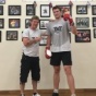 An attorney from Germany, Ivo Simik, flew back to the United States to train with the Boxing Coach, Michael Kozlowski.